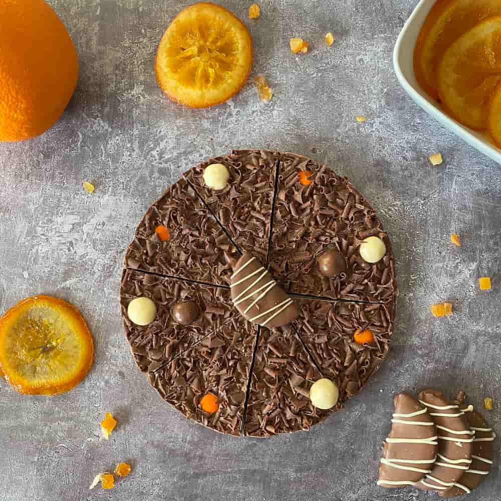 Our Ultimately Orange Chocolate Pizza is now infused with natural orange oil